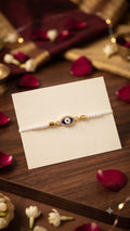 Ivory Evil Eye Crystal Bhai Rakhi