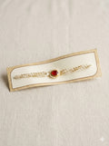 Red Floral Pearl Cream Bhai Rakhi